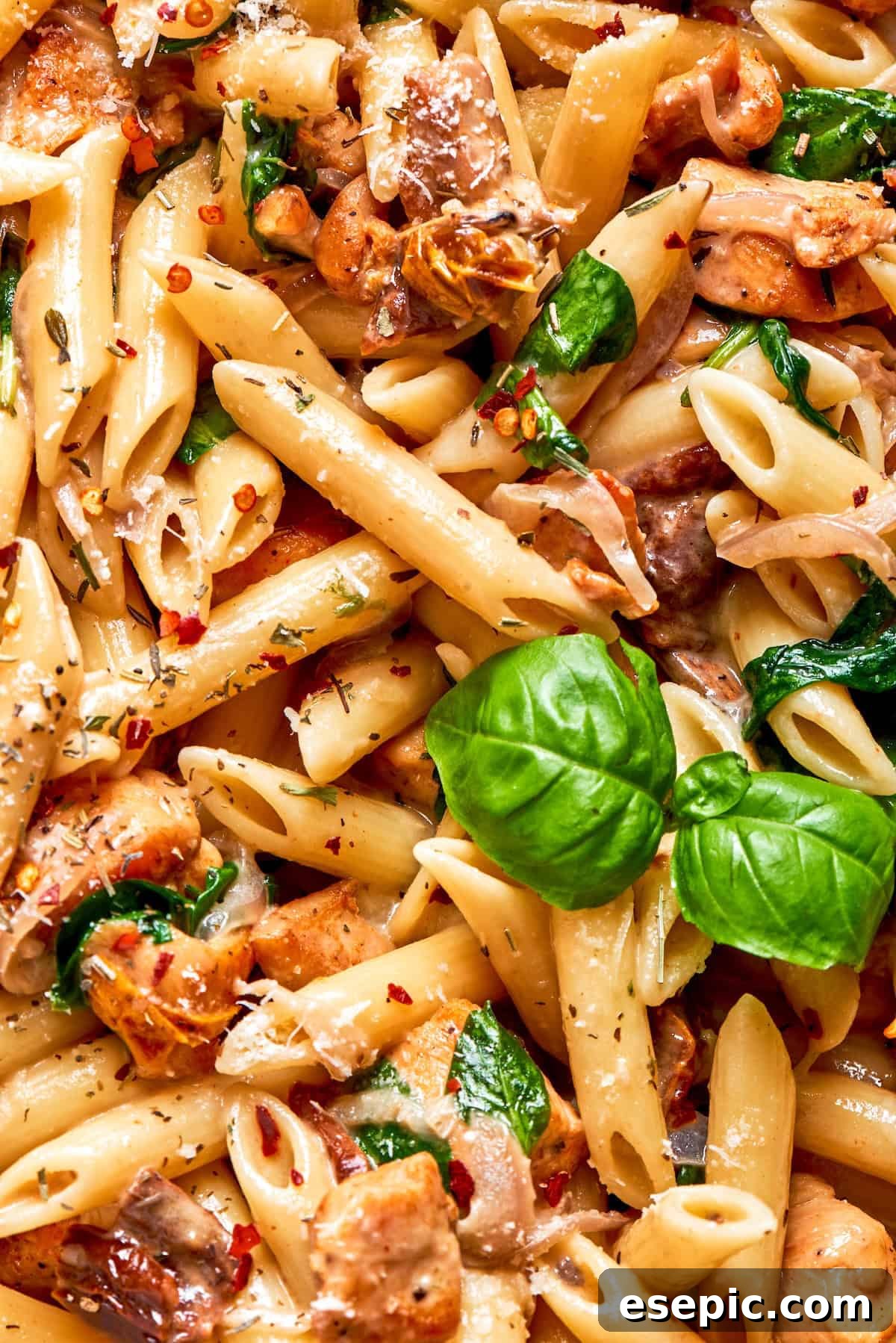 Cheesy, marry me chicken pasta features tender bites of chicken swirled in a creamy sauce along with sundried tomatoes and pasta. Pasta and basil for marry me chicken pasta.