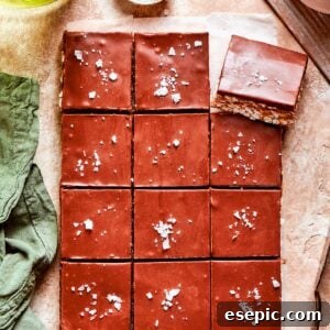 Peanut Butter Chocolate Crunch Bars 2 One dozen scotcharoos on a counter, ready to be enjoyed.