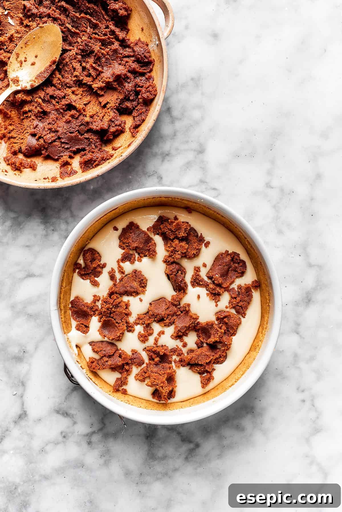 Cinnamon swirl mix is added to cheesecake batter.