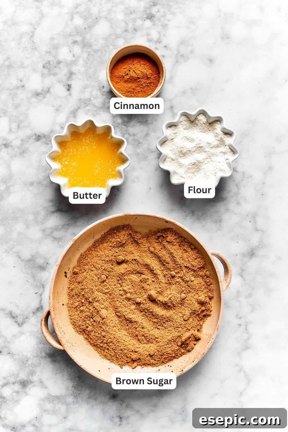 The ingredients for a cinnamon swirl for cheesecake are portioned and text-labeled.