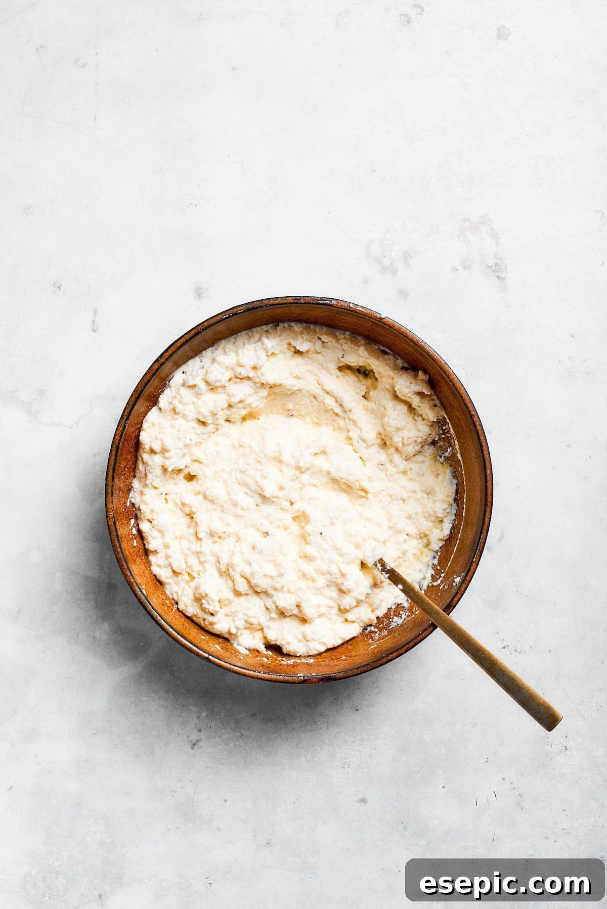 The best beef lasagna recipe is packed with tons of meaty, cheesy flavor and a rich and savory sauce. Make ahead friendly! A bowl of creamy ricotta cheese mixture, perfectly blended for filling lasagna layers.