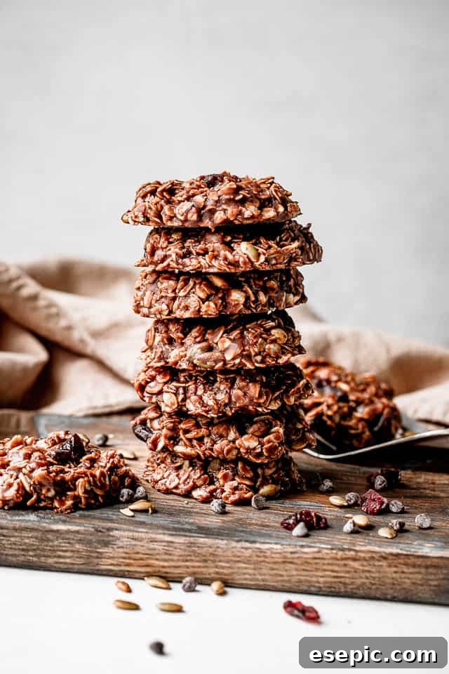 Effortless No-Bake Oat Treats 6 A close-up shot of a perfect stack of seven healthy no-bake oatmeal cookies, ready to be enjoyed as a wholesome snack.