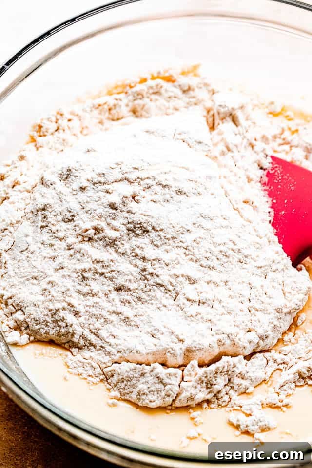 pancake batter in a glass mixing bowl