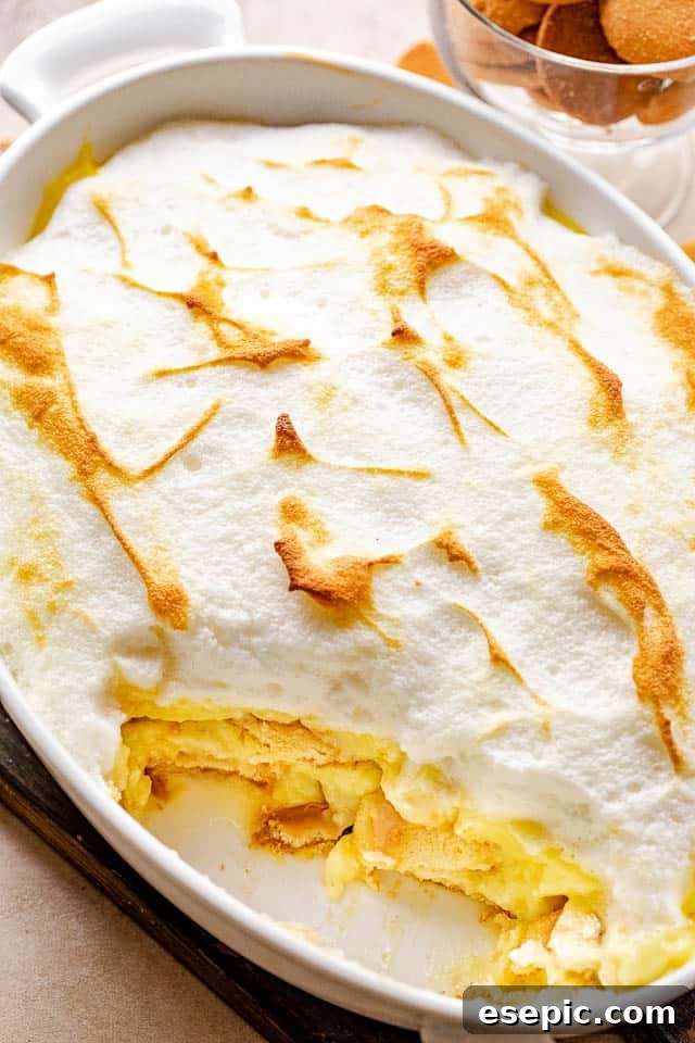 top view of a banana pudding dessert in a white baking dish