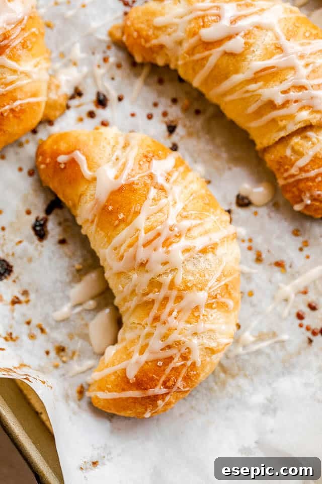 top shot of glazed pumpkin cheesecake crescent rolls