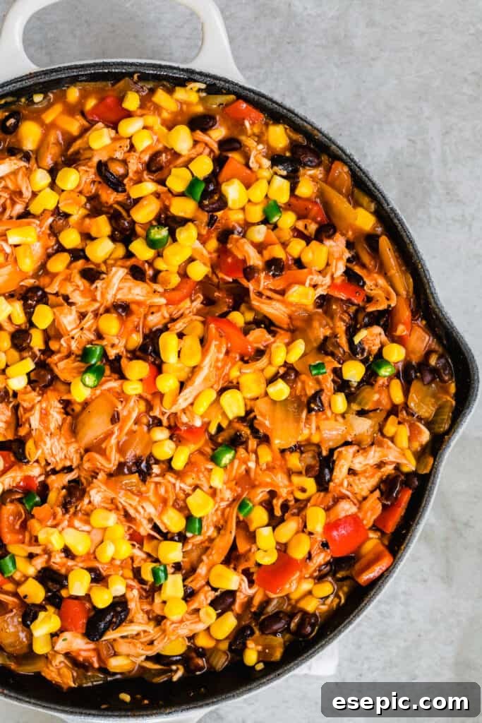 A Chicken Casserole with Corn and Other Veggies in a Skillet