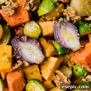 Beautifully roasted vegetables with walnuts and herbs, ready to serve.