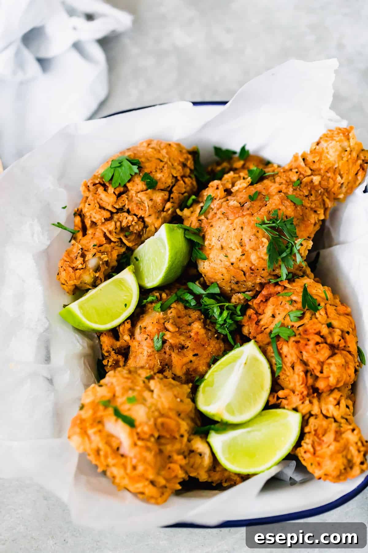 Fried Chicken in a Dish Lined with A Piece of Parchment Paper