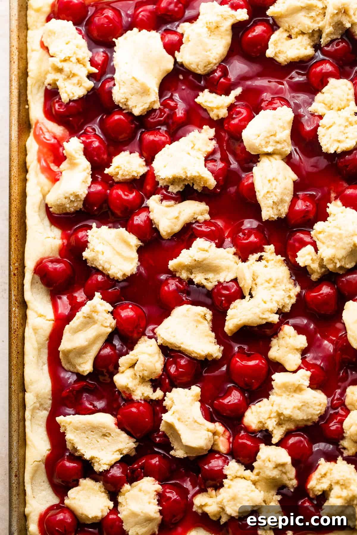 Scoops of Dough Overtop Cherry Pie