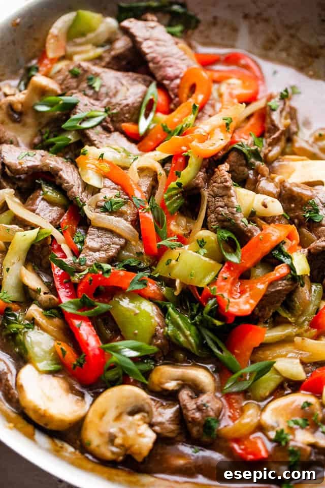 Sticky Honey Balsamic Beef 6 close up photo of beef stir fry with bell peppers, bok choy, mushrooms, and pepper