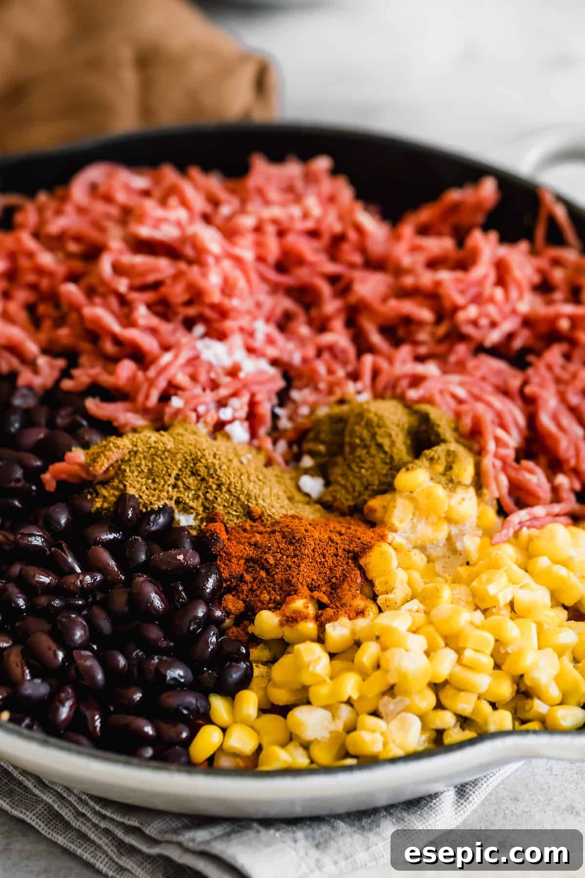 Corn, Ground Beef and Black Beans in a Skillet with Mexican Spices