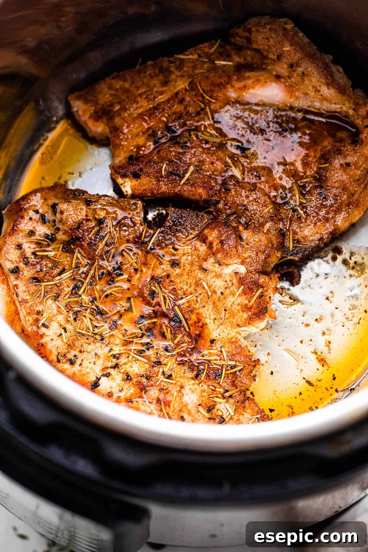 Browning bone-in pork chops inside the Instant Pot before pressure cooking