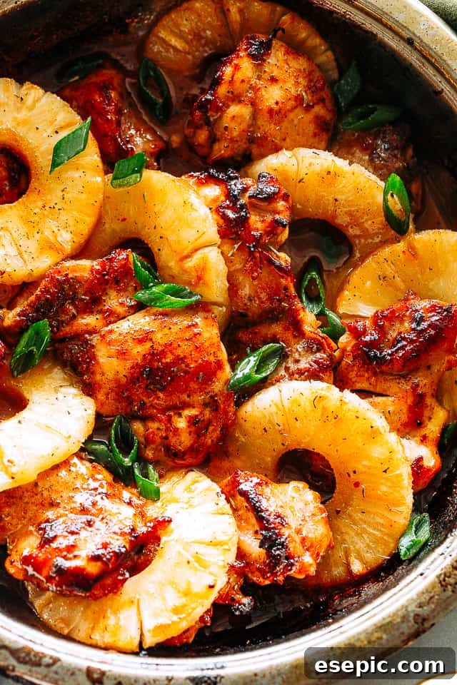 Juicy, tender, and flavorful, these pineapple barbecue chicken thighs are one of my favorite easy weeknight dinner ideas! Done in 20 minutes! Juicy Pineapple Barbecue Chicken Thighs glistening with a sweet and tangy glaze.