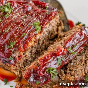 Meatloaf Covered in Barbecue Sauce on a White Serving Platter