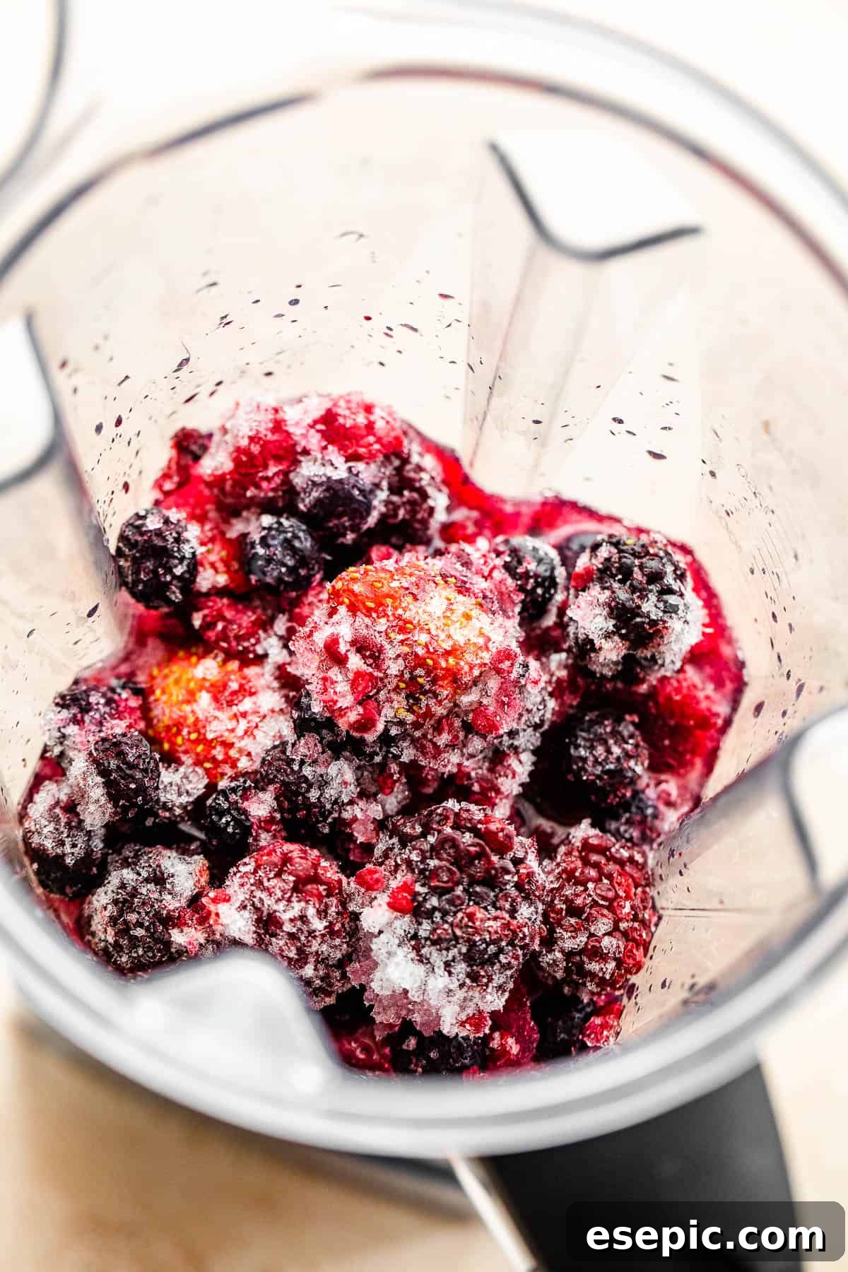 frozen berries in a blender