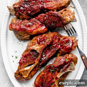 Four Instant Pot Ribs Garnished with Chopped Parsley on a White Plate
