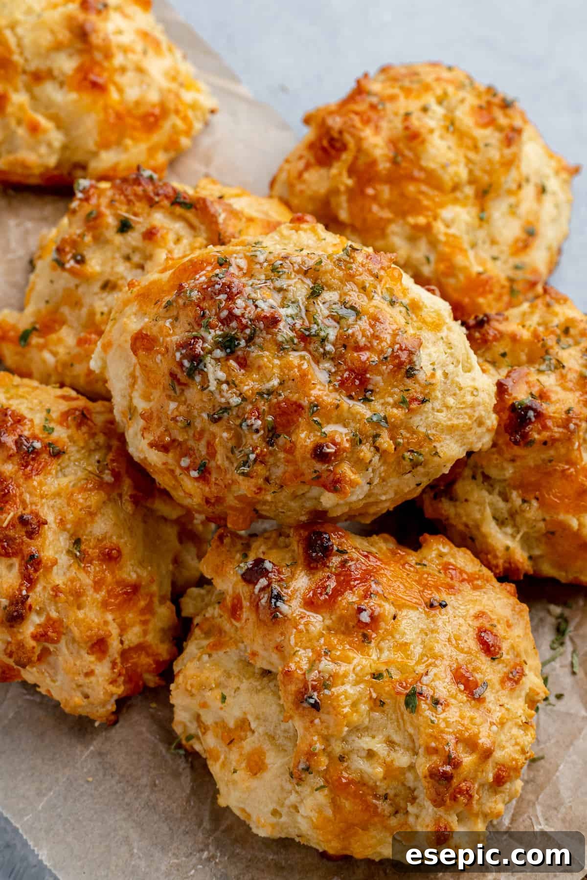 A beautiful bird's eye view of a generous pile of freshly baked, golden-brown Red Lobster Biscuits.