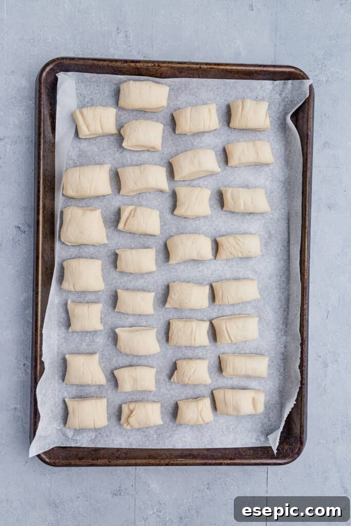 Cinnamon Sugar Pretzel Poppers 6 Cut pretzel dough pieces ready for baking