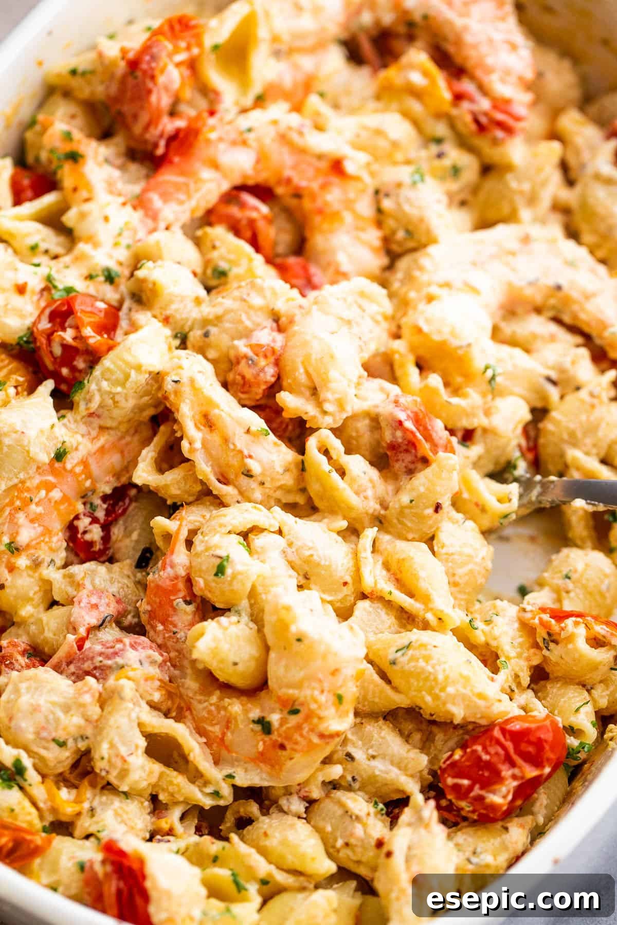 Cream Cheese and Shrimp Pasta Bake 3 shrimp and pasta tossed with a cream cheese sauce and cherry tomatoes
