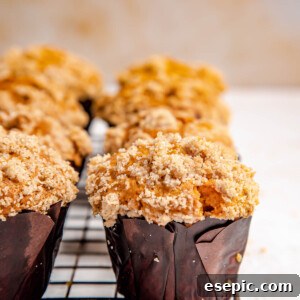 Pumpkin muffins cooling on a wire rack