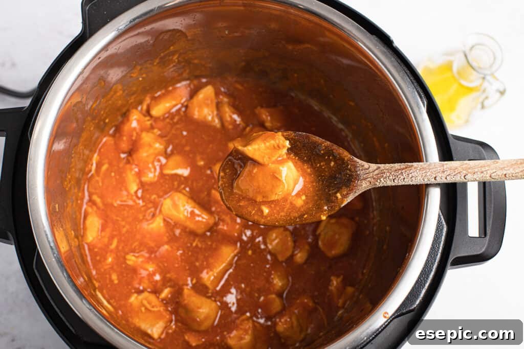 Effortless Instant Pot Orange Chicken 7 Orange chicken with the sauce thickened.