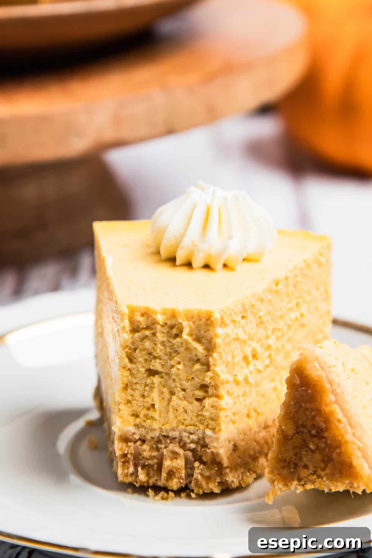 Irresistible Instant Pot Pumpkin Cheesecake 8 A top-down view of a ready-to-serve pumpkin cheesecake, showcasing its smooth texture and rich color.
